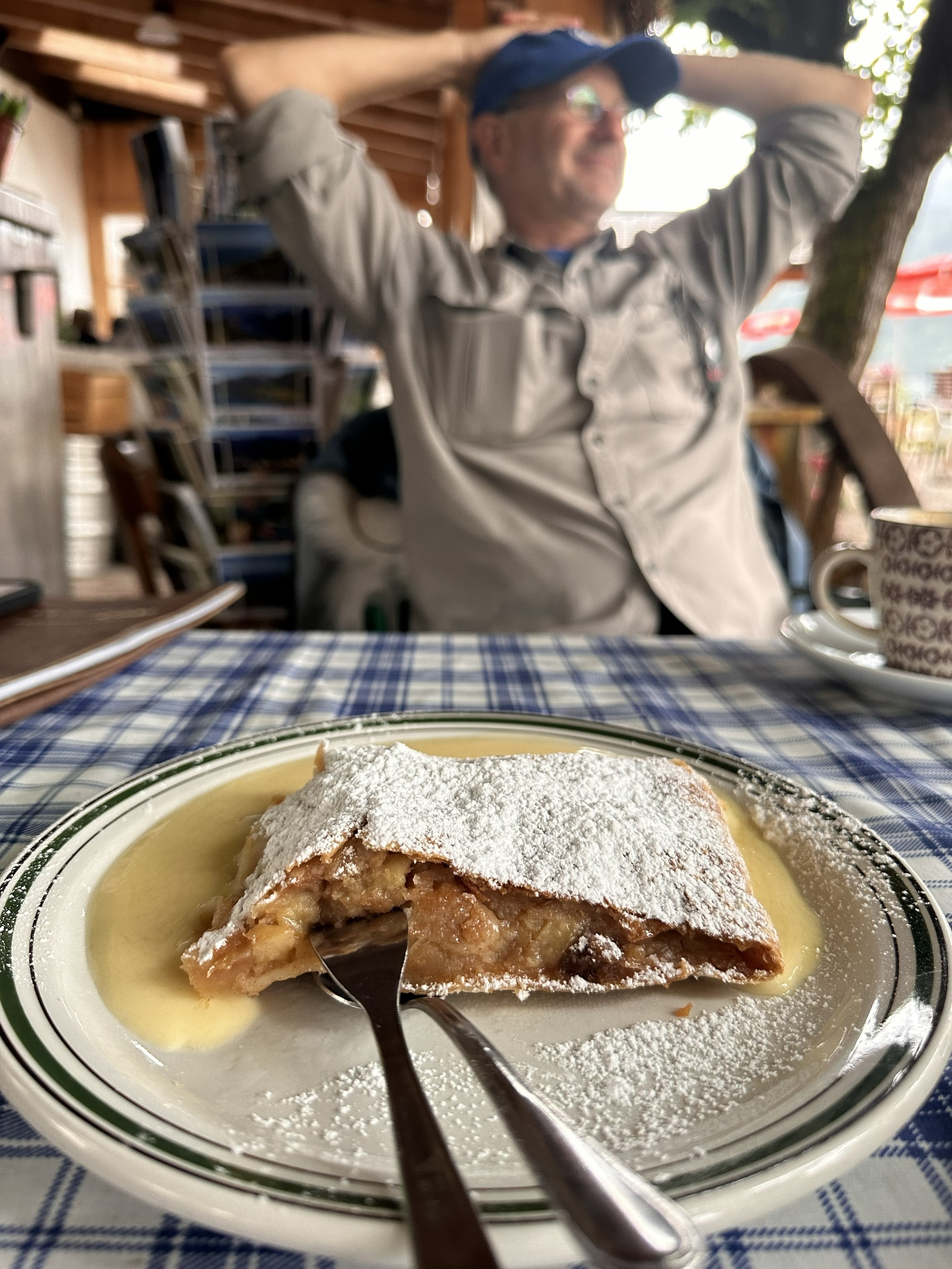 Steve eating apple strudel at Madame Lore's café in Bad Ischl